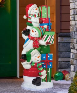 Trio de bonshommes de neige et leur tour de cadeaux